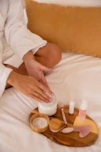 close up hands using cream 23 2149168521